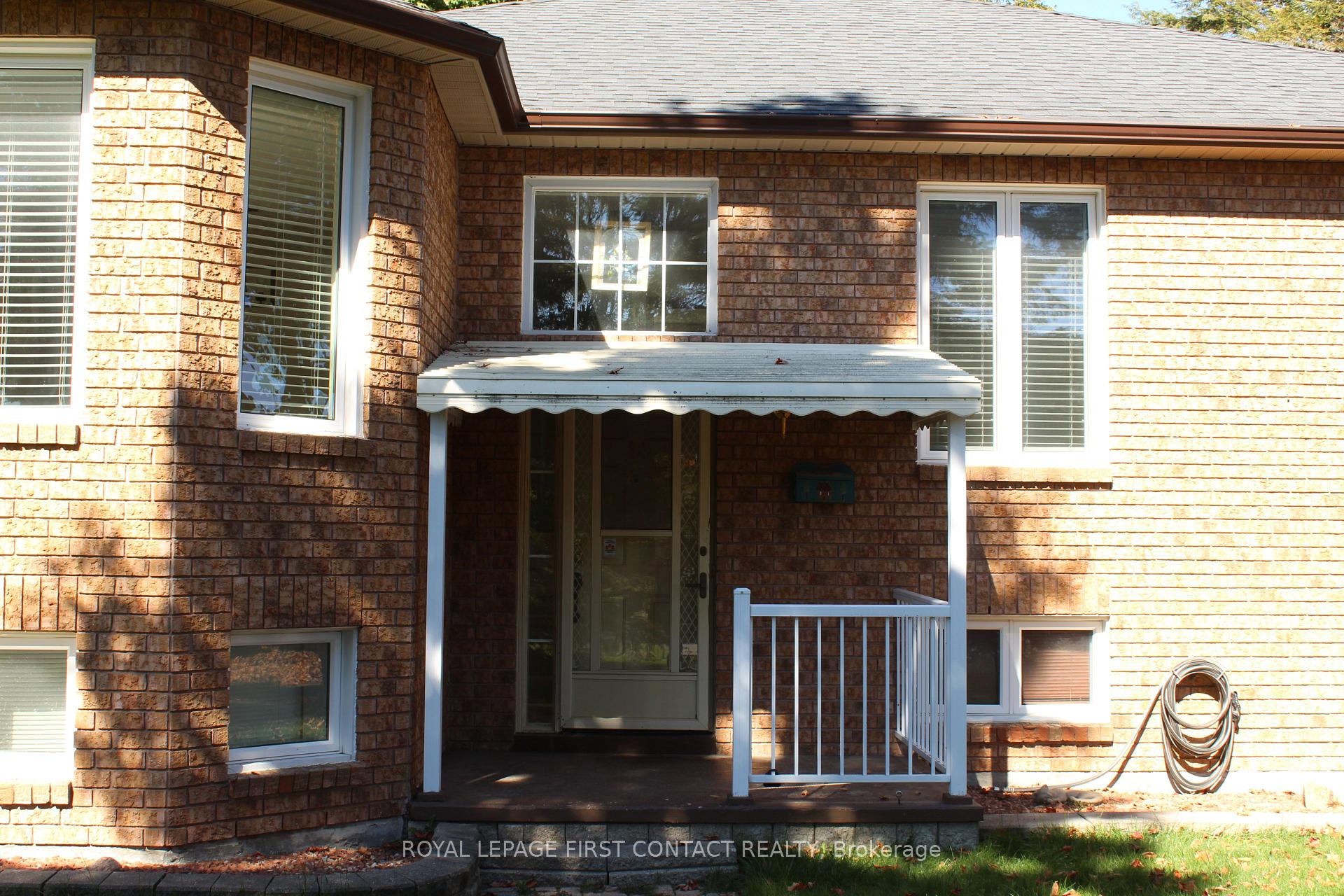 Photo 4 of 14 Fairway Crescent, Wasaga Beach — HOMEH