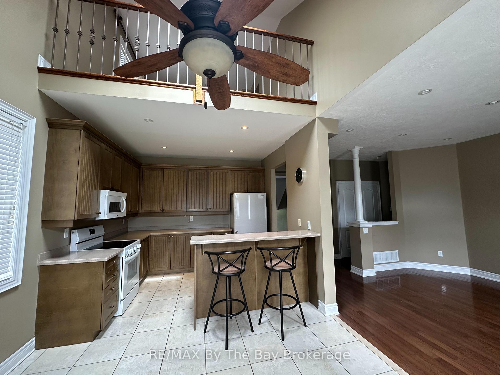 Photo 4 of 64 Oriole Crescent, Wasaga Beach — HOMEH