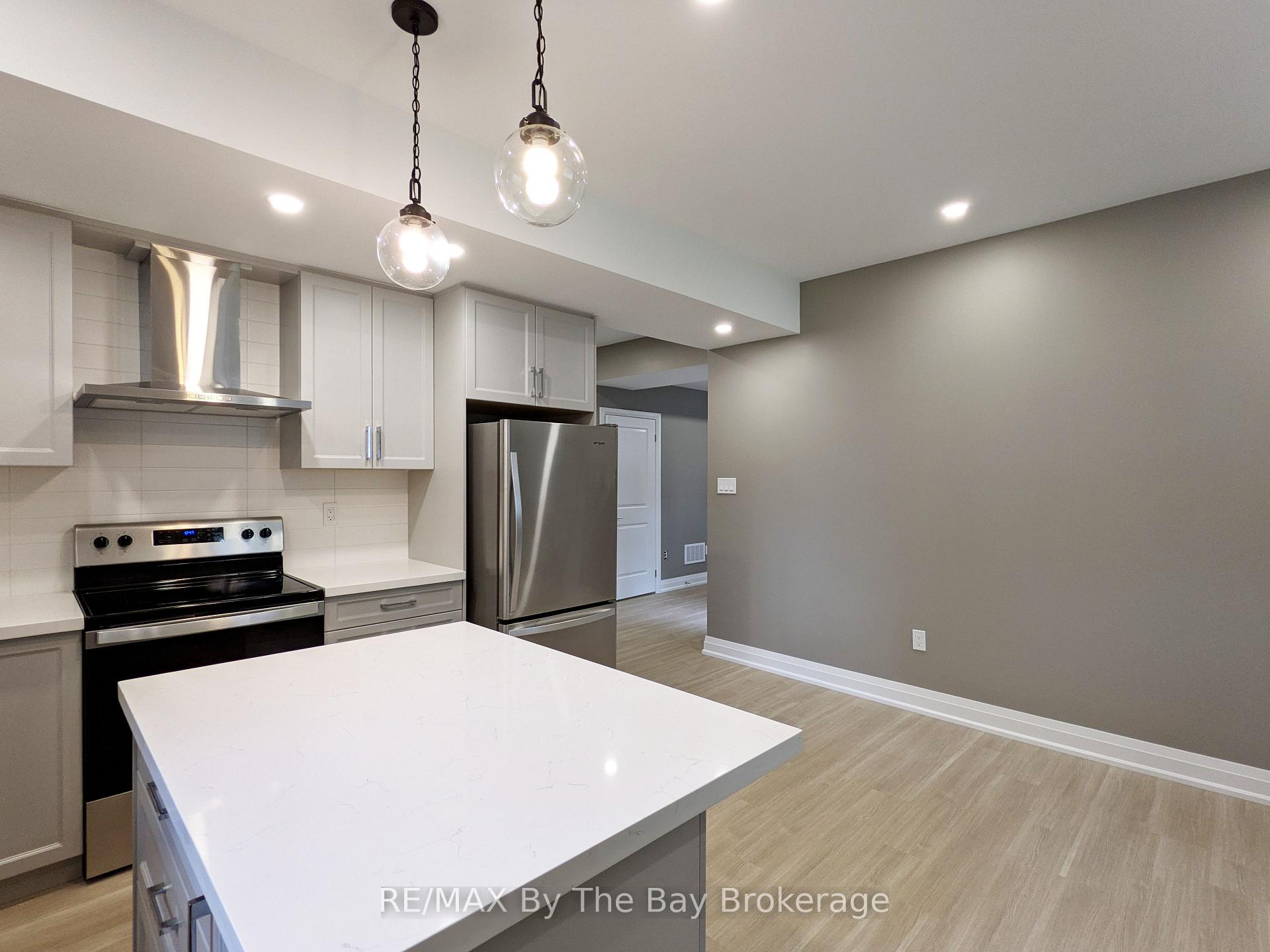 Photo 6 of Unit Lower Level, 66 Regina Boulevard, Wasaga Beach — HOMEH