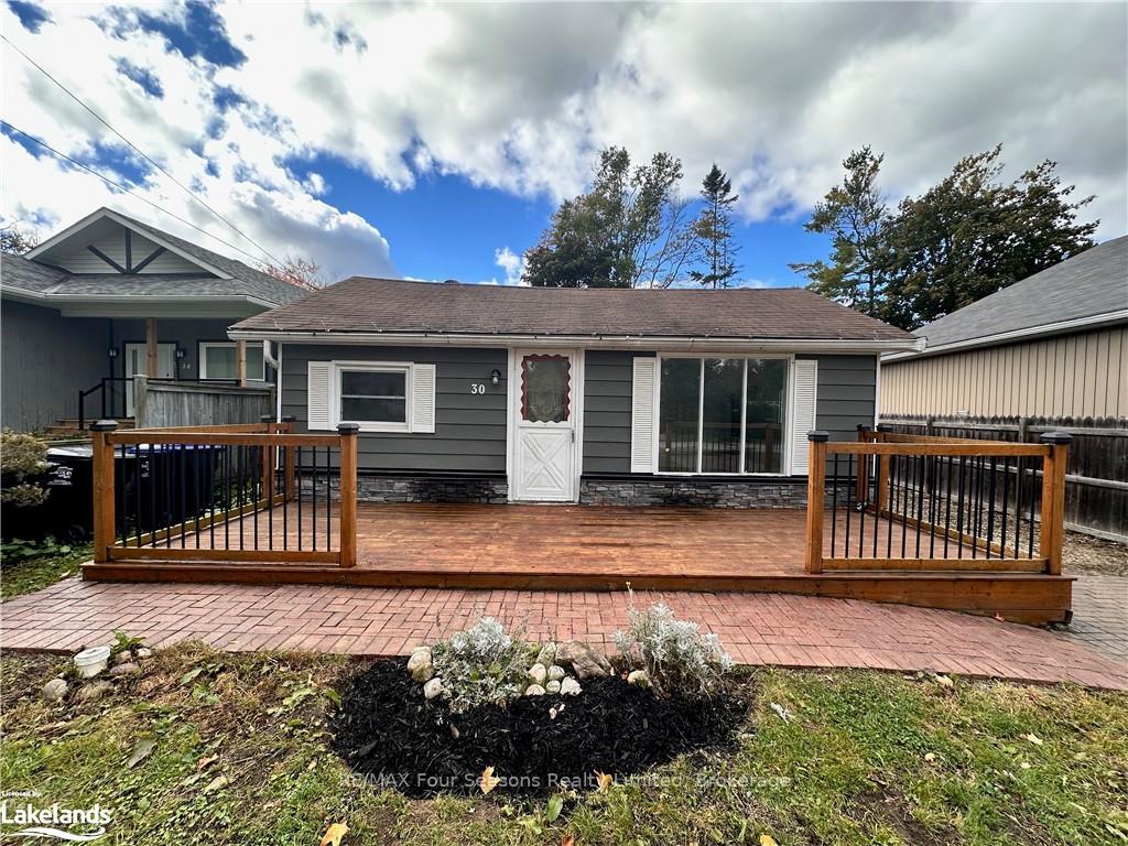 Photo 2 of 30 64th Street N, Wasaga Beach — HOMEH