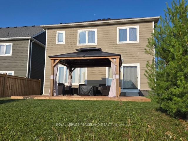 Photo 2 of 22 Sandhill Crane Drive, Wasaga Beach — HOMEH