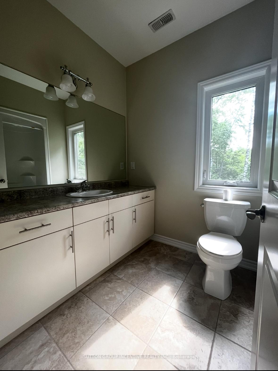 Photo 13 of Unit A, 1801 River Road, Wasaga Beach — HOMEH
