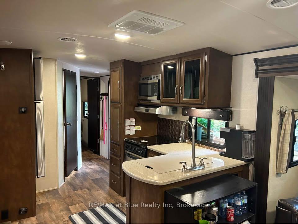 Photo 7 of Unit H 21, 7489 Sideraod 5 E, Wellington North, Rural Wellington North — HOMEH