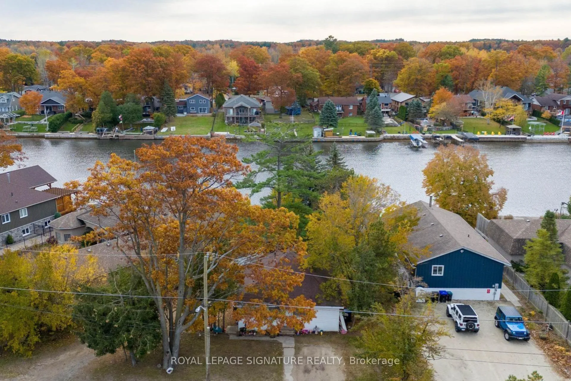 Photo 3 of 75 Old Mosley Street, Wasaga Beach — HOMEH