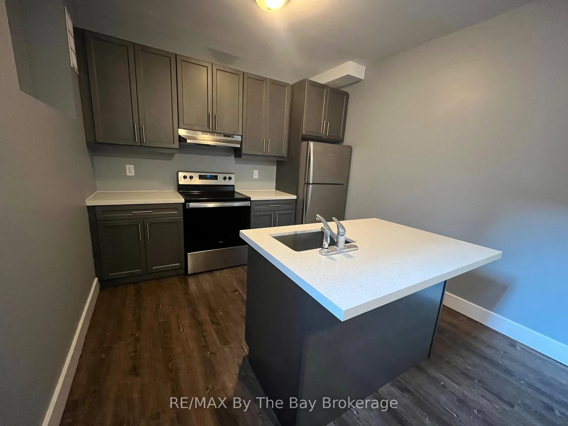 Photo 5 of Unit BSMT, 3148 Mosley Street, Wasaga Beach — HOMEH