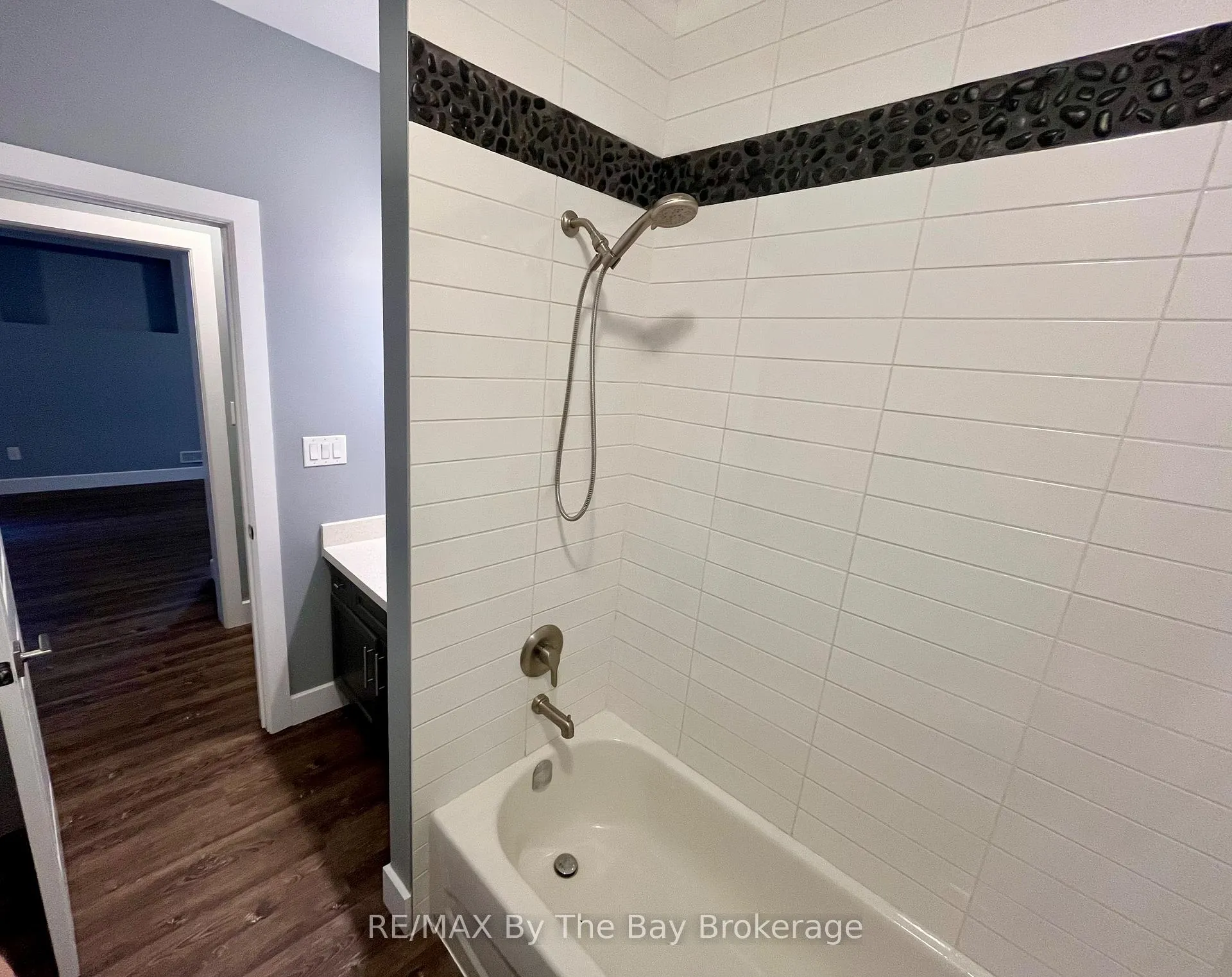 Photo 10 of Unit BSMT, 3148 Mosley Street, Wasaga Beach — HOMEH