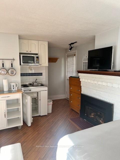 Photo 6 of 1055 Mosley Street, Wasaga Beach — HOMEH