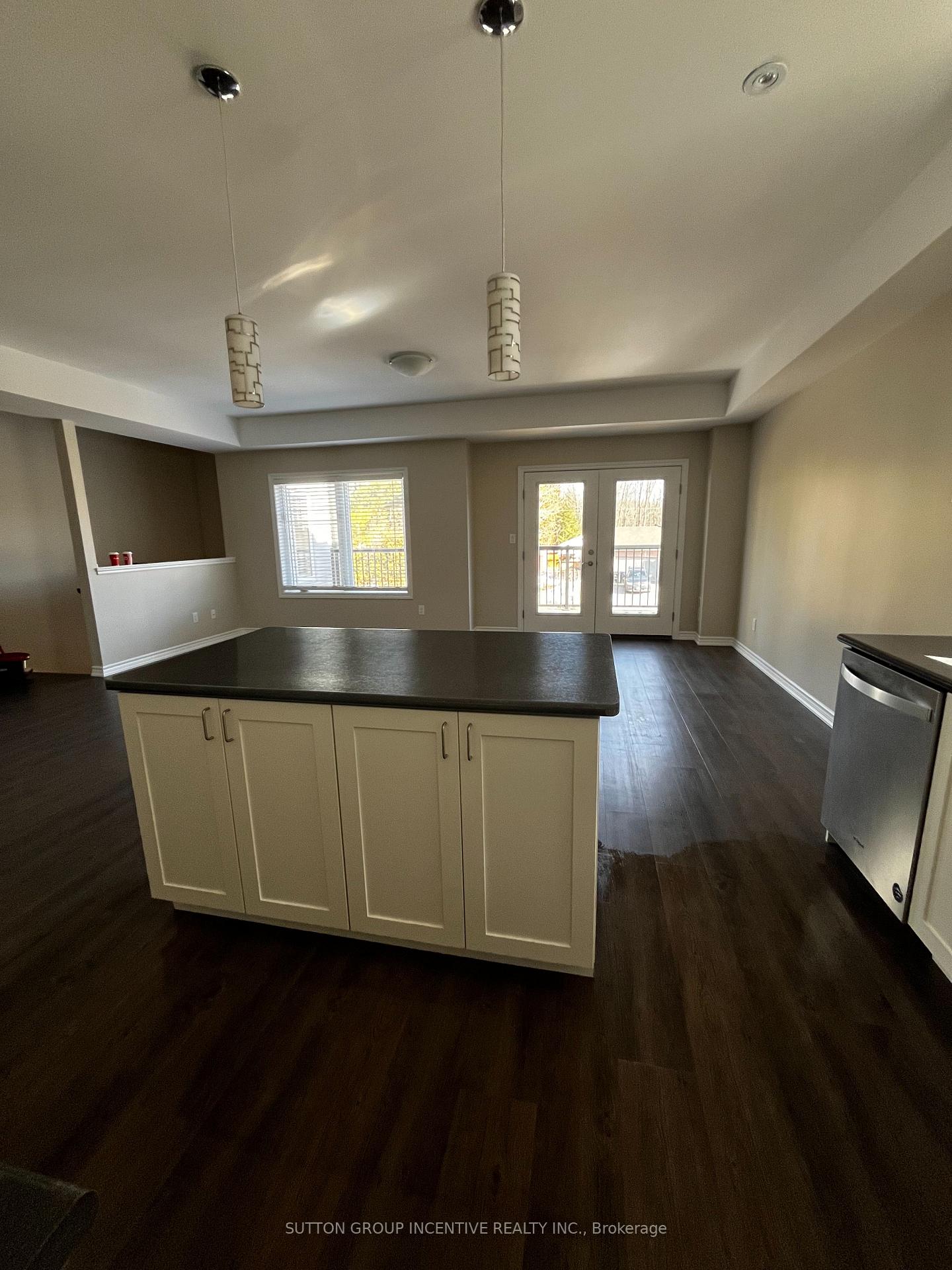 Photo 5 of Unit A, 120 40th Street, Wasaga Beach — HOMEH