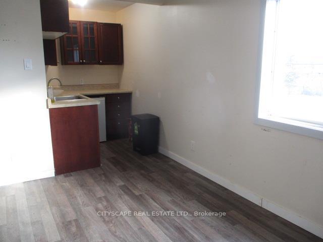 Photo 2 of Unit Studio, 207 Main Street, Wasaga Beach — HOMEH