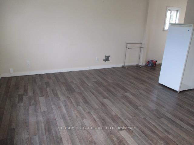 Photo 4 of Unit Studio, 207 Main Street, Wasaga Beach — HOMEH