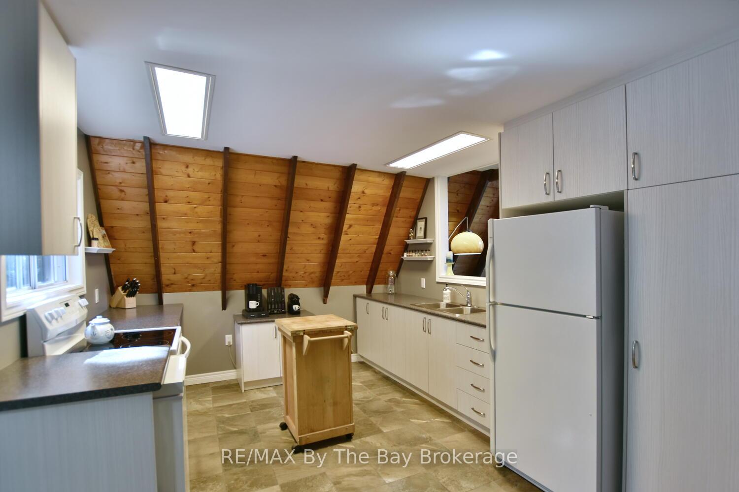 Photo 17 of 1335 River Road E, Wasaga Beach — HOMEH