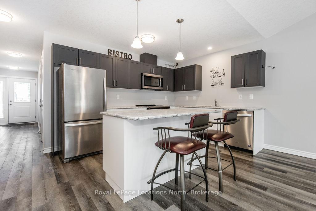 Photo 2 of 26 Ivy Crescent, Wasaga Beach — HOMEH
