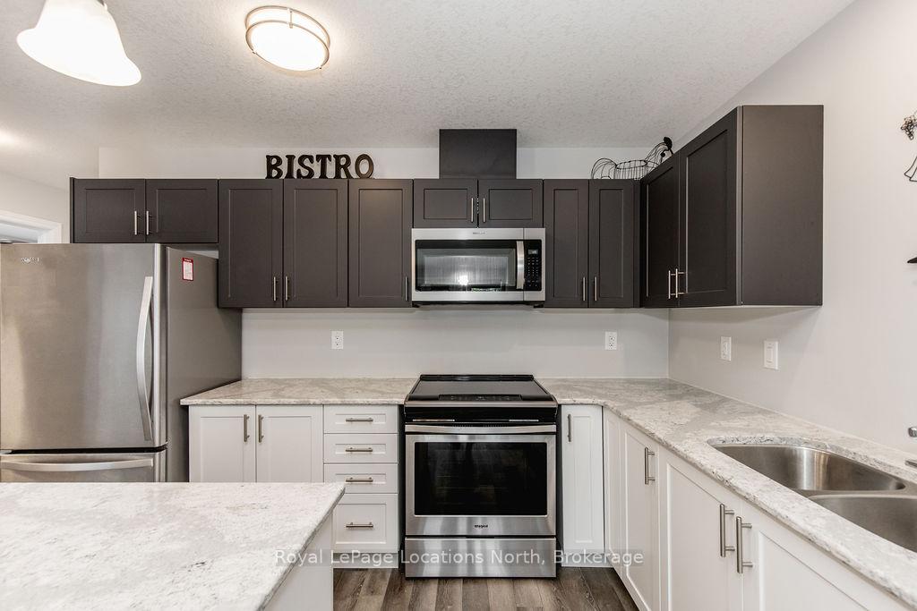 Photo 4 of 26 Ivy Crescent, Wasaga Beach — HOMEH