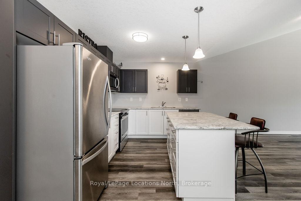 Photo 6 of 26 Ivy Crescent, Wasaga Beach — HOMEH