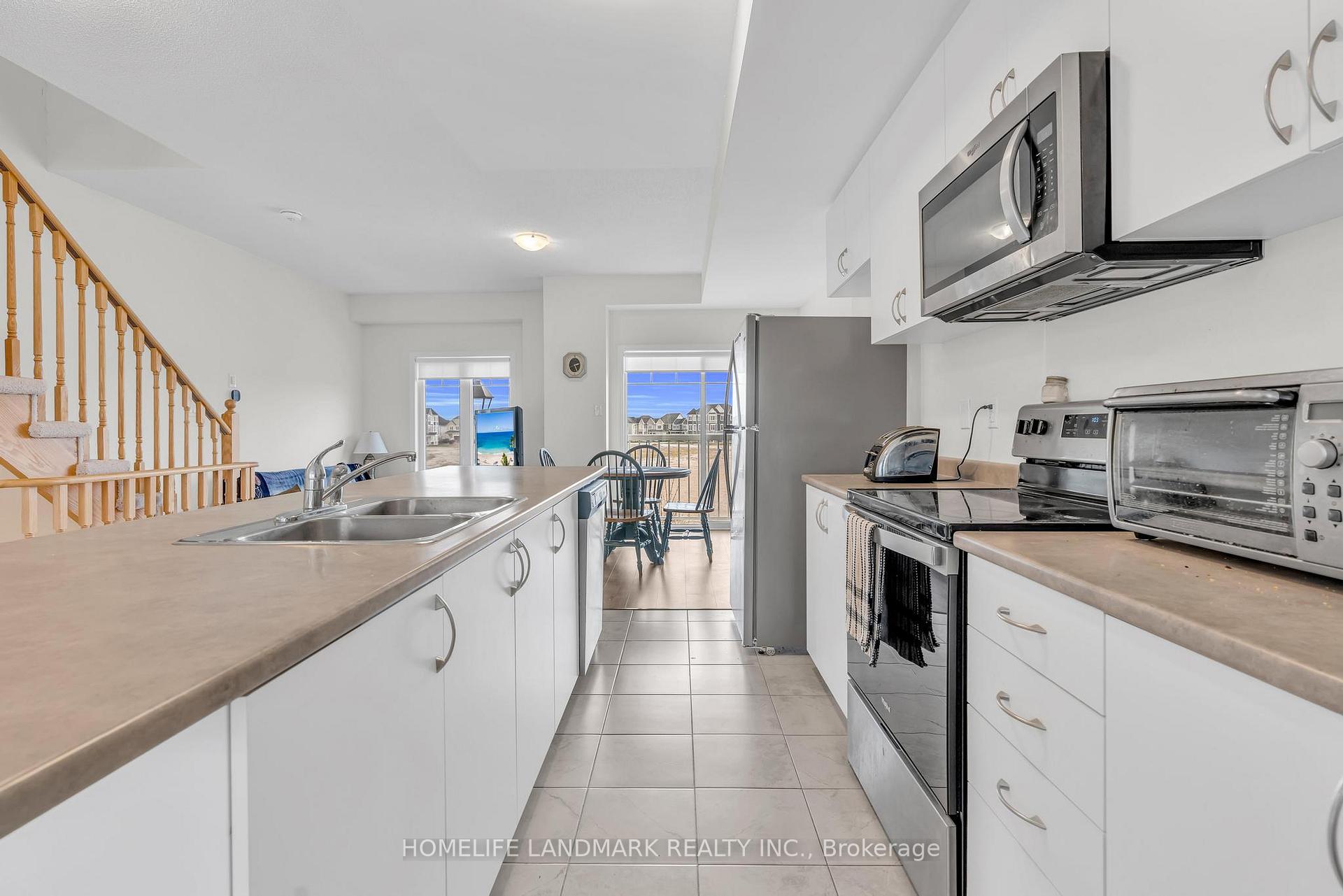 Photo 17 of 111 Sandhill Crane Drive, Wasaga Beach — HOMEH
