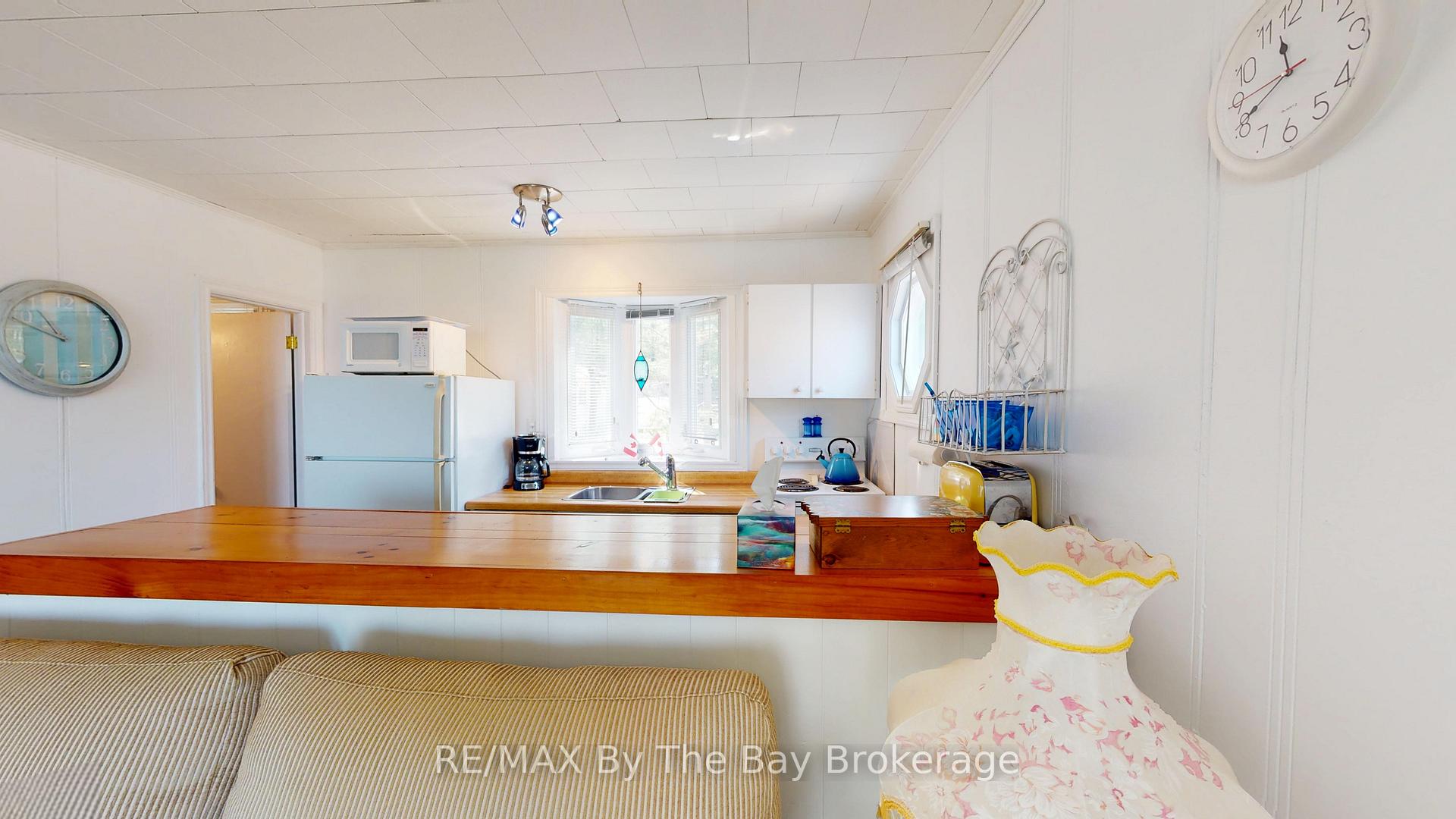 Photo 12 of Unit 3, 5 29th Street N, Wasaga Beach — HOMEH
