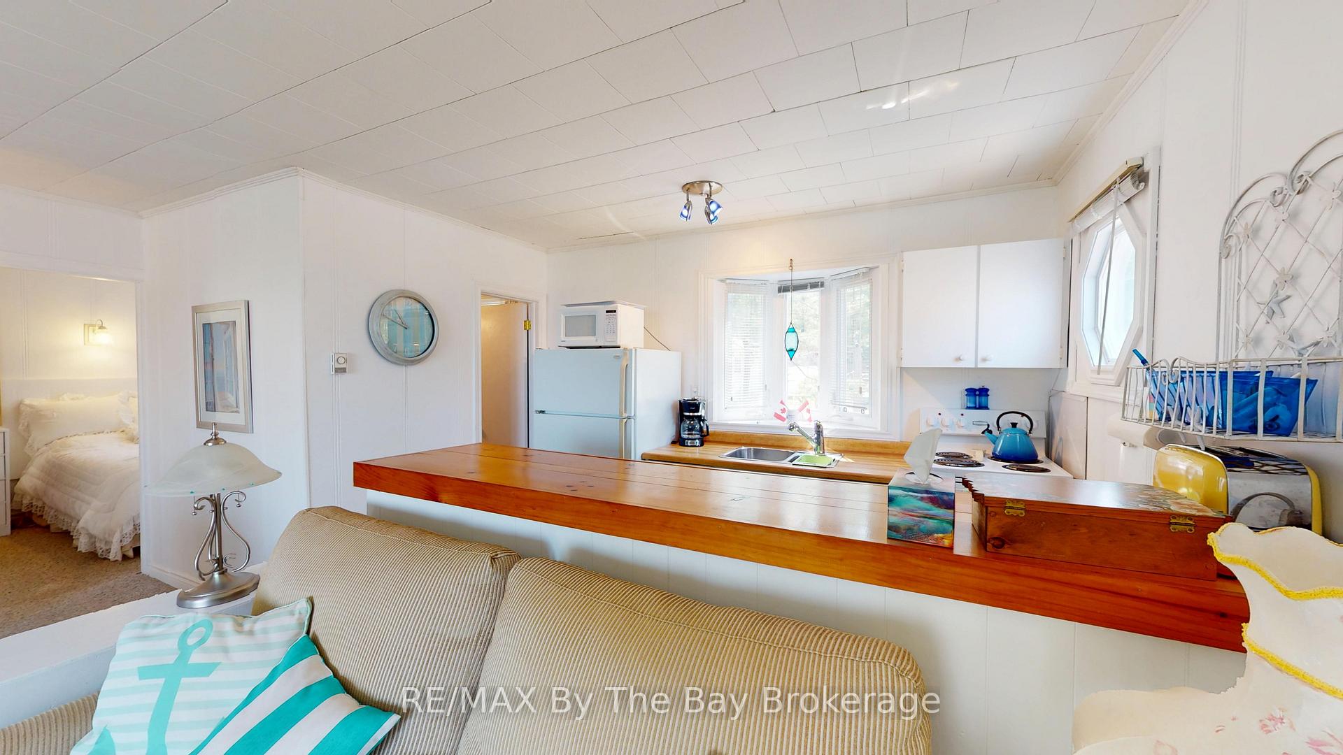 Photo 15 of Unit 3, 5 29th Street N, Wasaga Beach — HOMEH