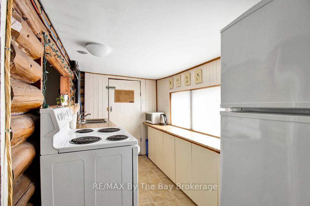 Photo 13 of 125 River Road E, Wasaga Beach — HOMEH
