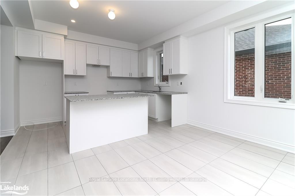 Photo 12 of 11 Amber Drive, Wasaga Beach — HOMEH