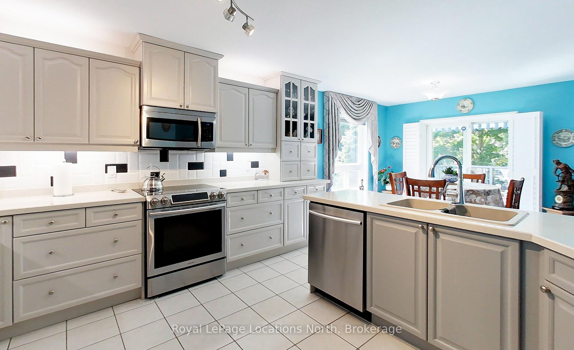 Photo 3 of 144 Royal Beech Drive, Wasaga Beach — HOMEH