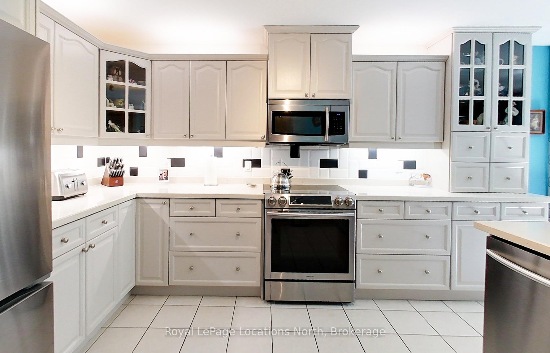 Photo 5 of 144 Royal Beech Drive, Wasaga Beach — HOMEH