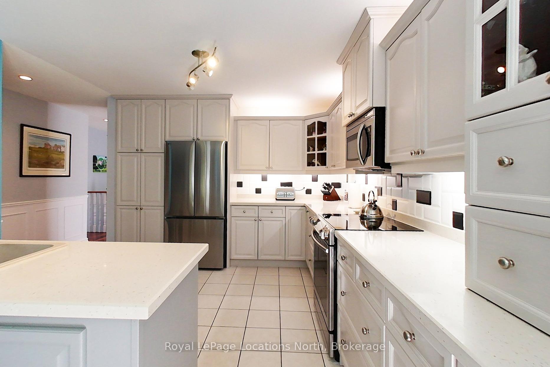Photo 6 of 144 Royal Beech Drive, Wasaga Beach — HOMEH