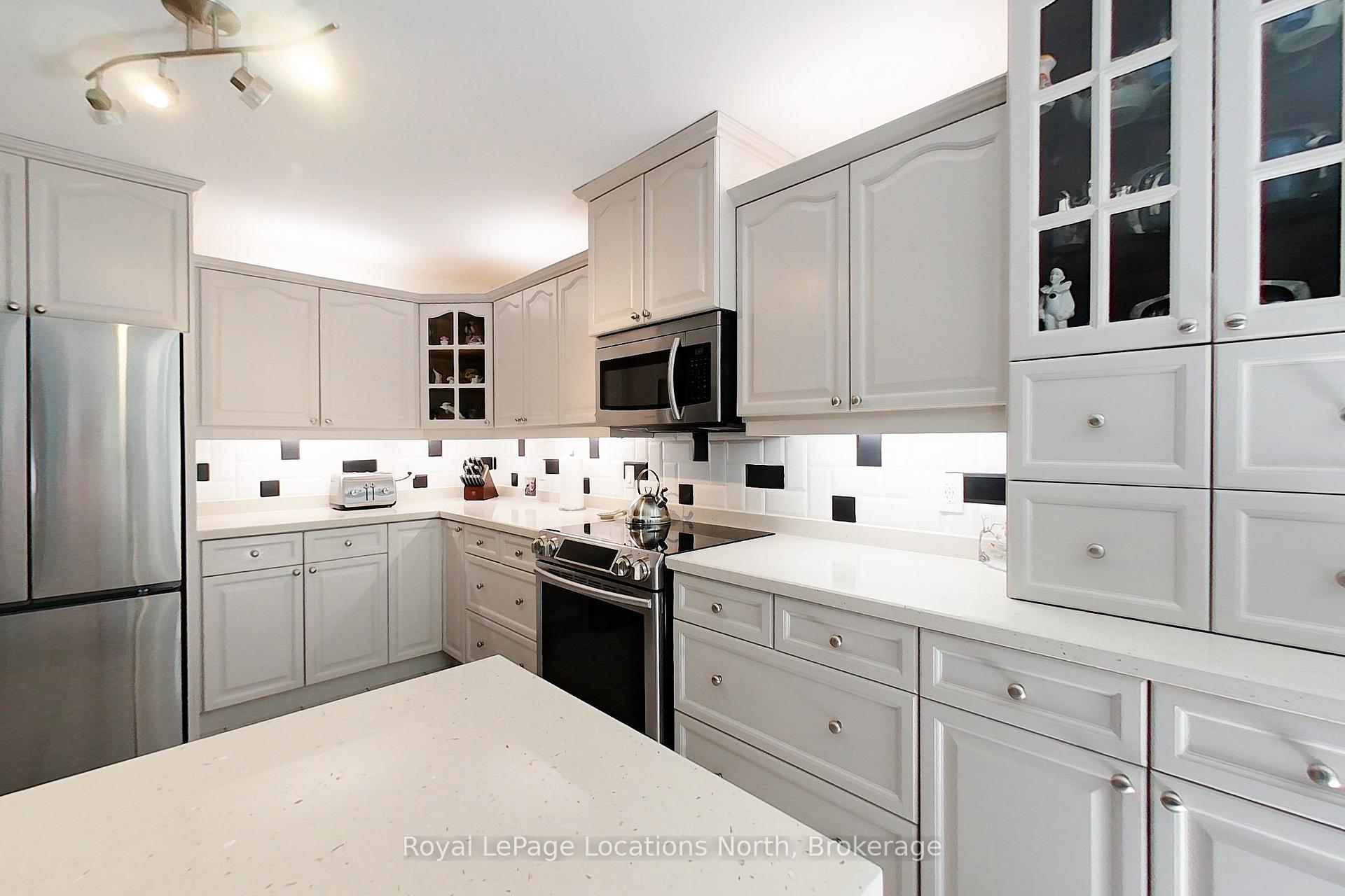 Photo 7 of 144 Royal Beech Drive, Wasaga Beach — HOMEH