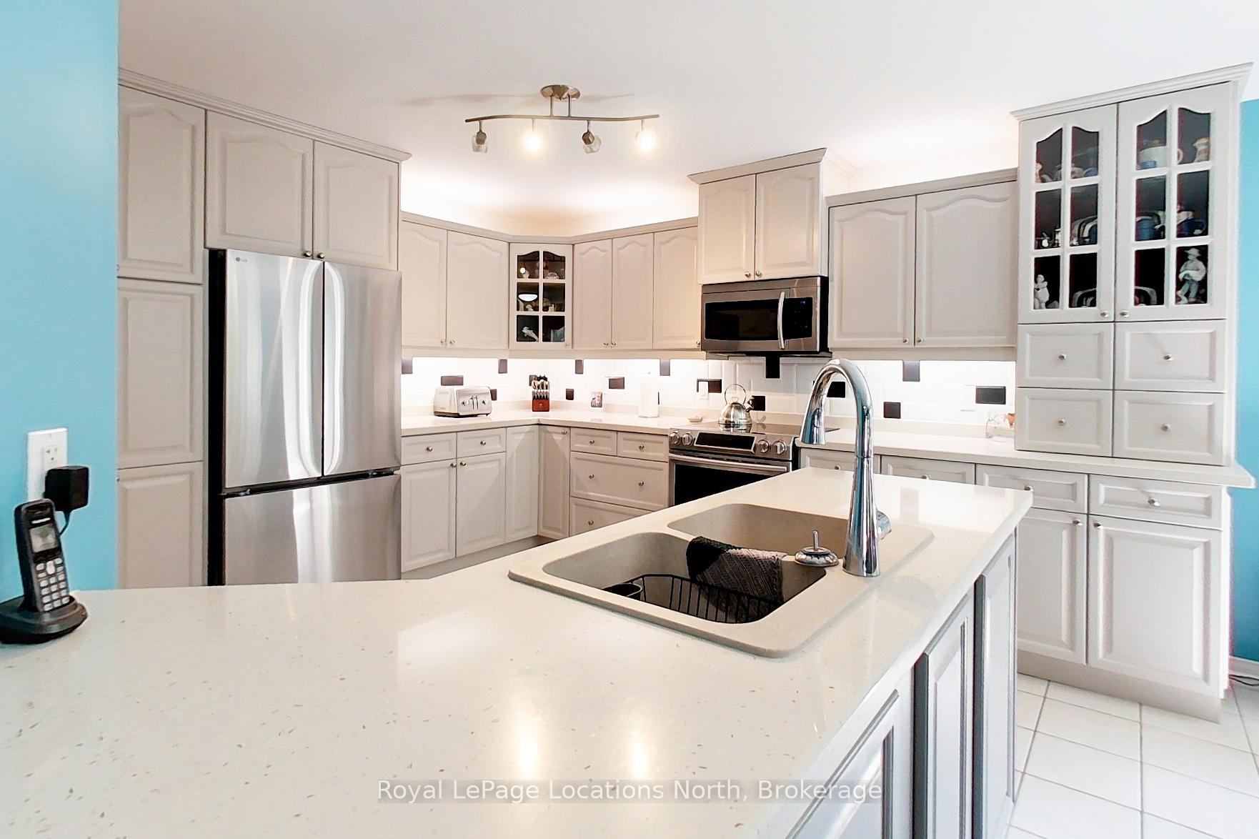 Photo 8 of 144 Royal Beech Drive, Wasaga Beach — HOMEH