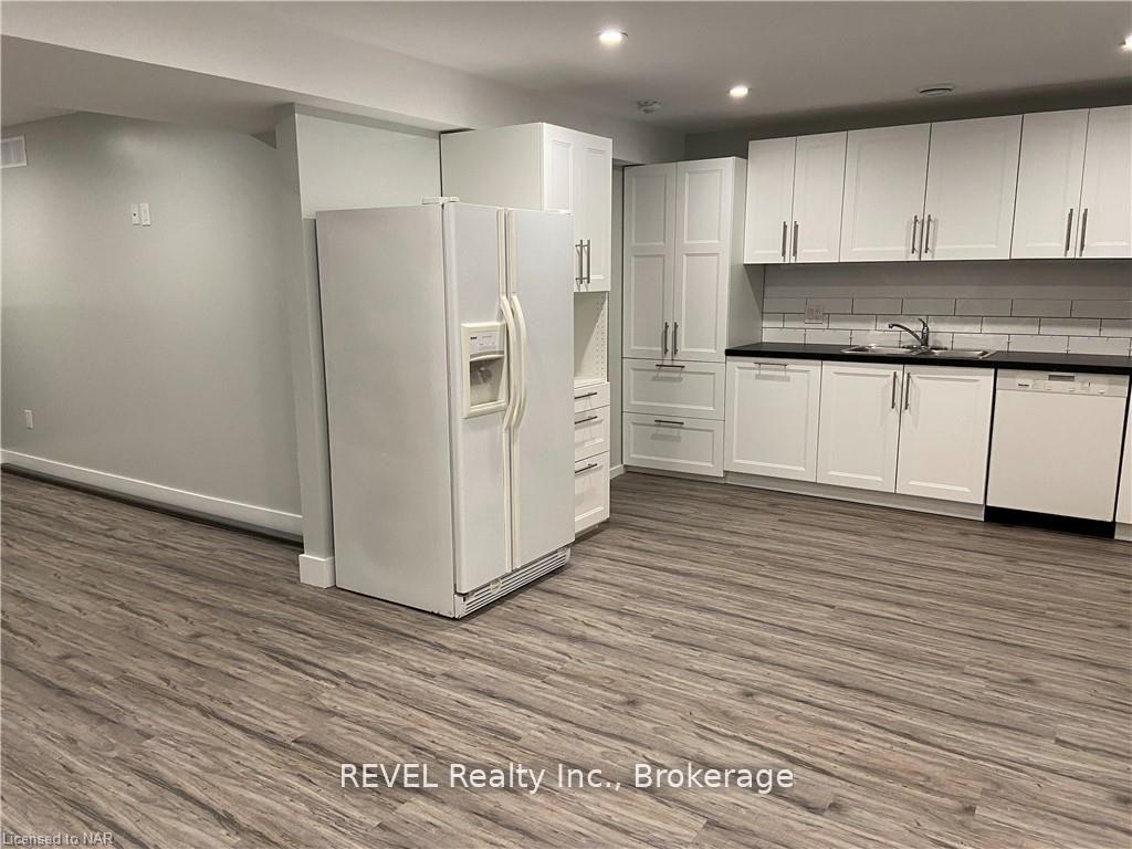 Photo 3 of Unit Basement, 214 Thorold Road, Welland, N. Welland — HOMEH