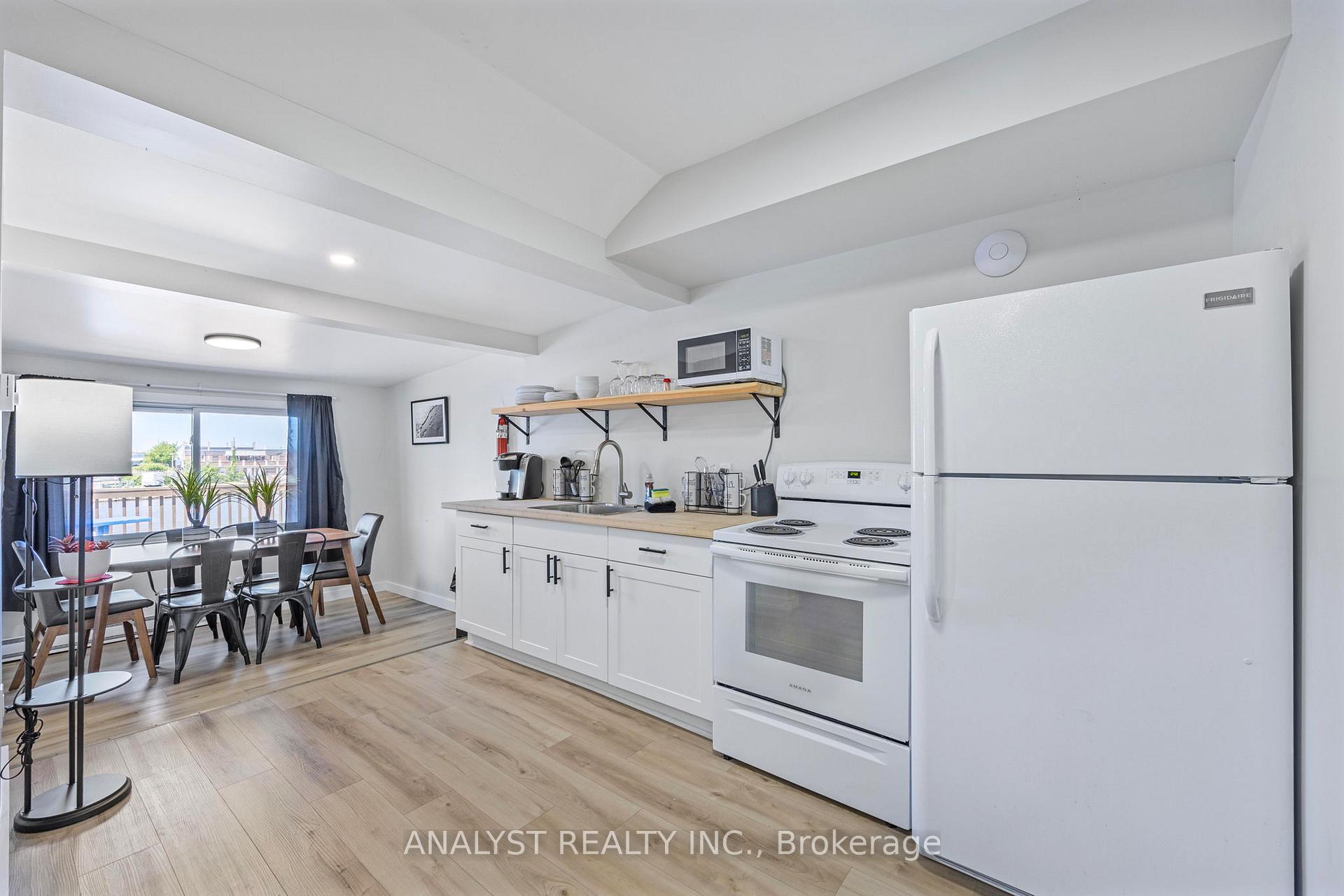Photo 7 of 28 River Avenue Crescent, Wasaga Beach — HOMEH