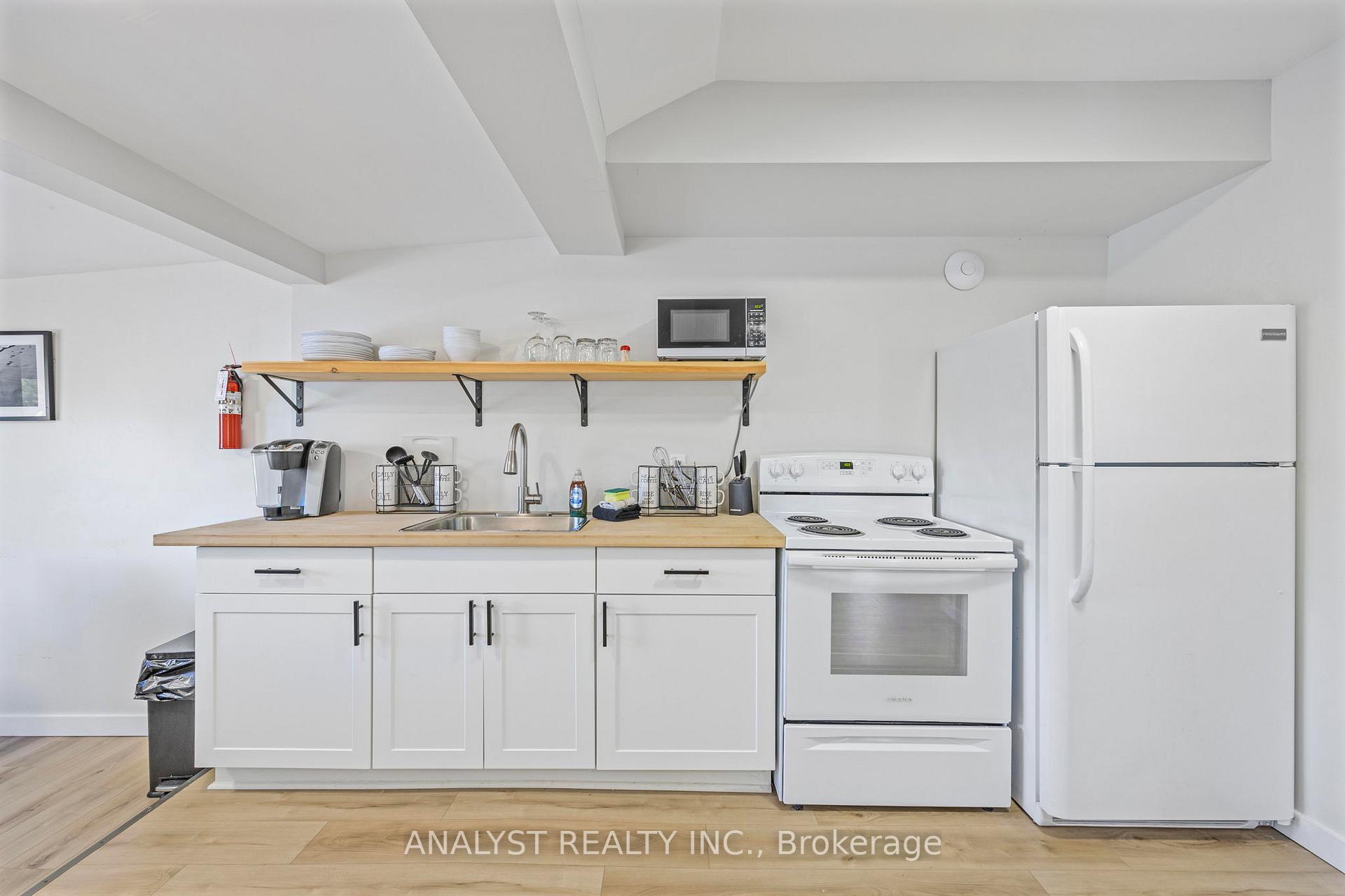 Photo 20 of 28 River Avenue Crescent, Wasaga Beach — HOMEH