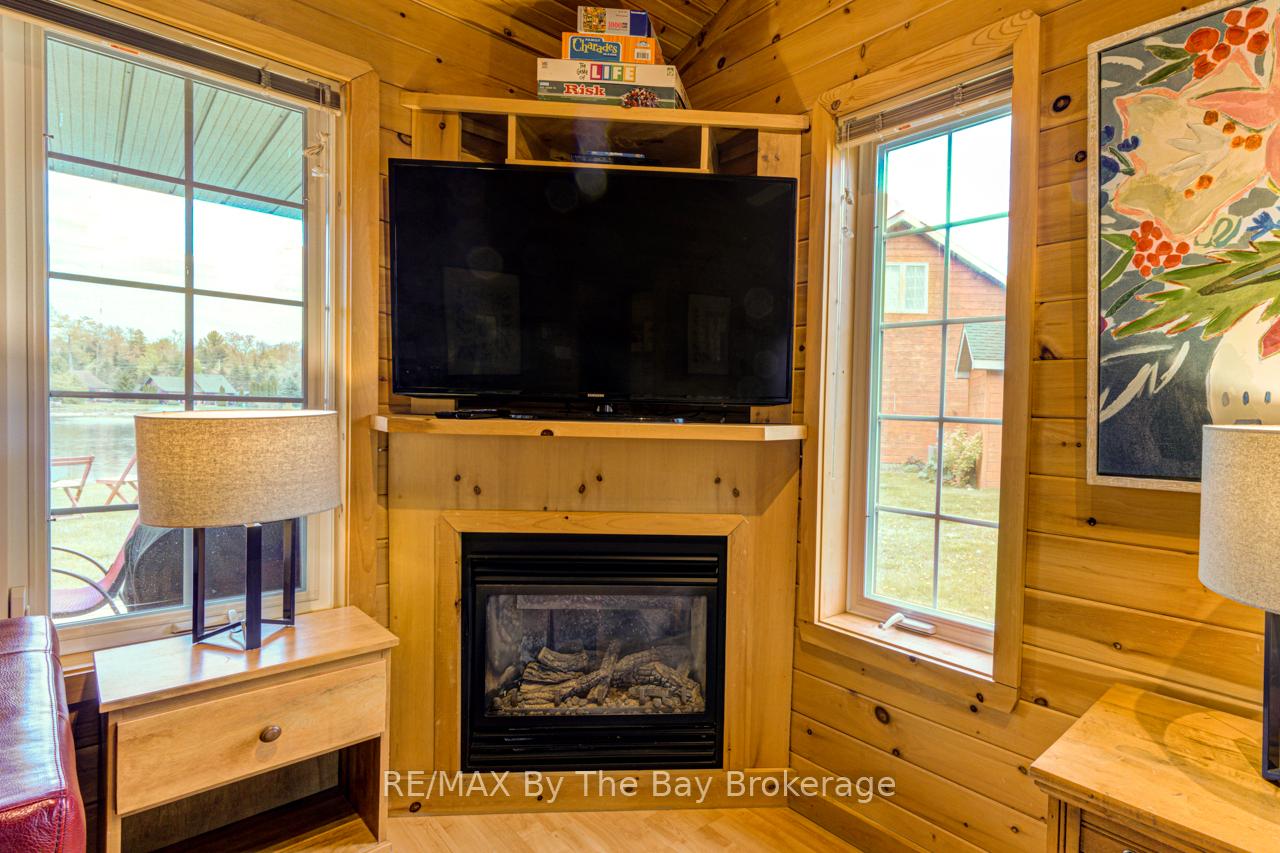 Photo 11 of 49 Cabin Crescent, Wasaga Beach — HOMEH