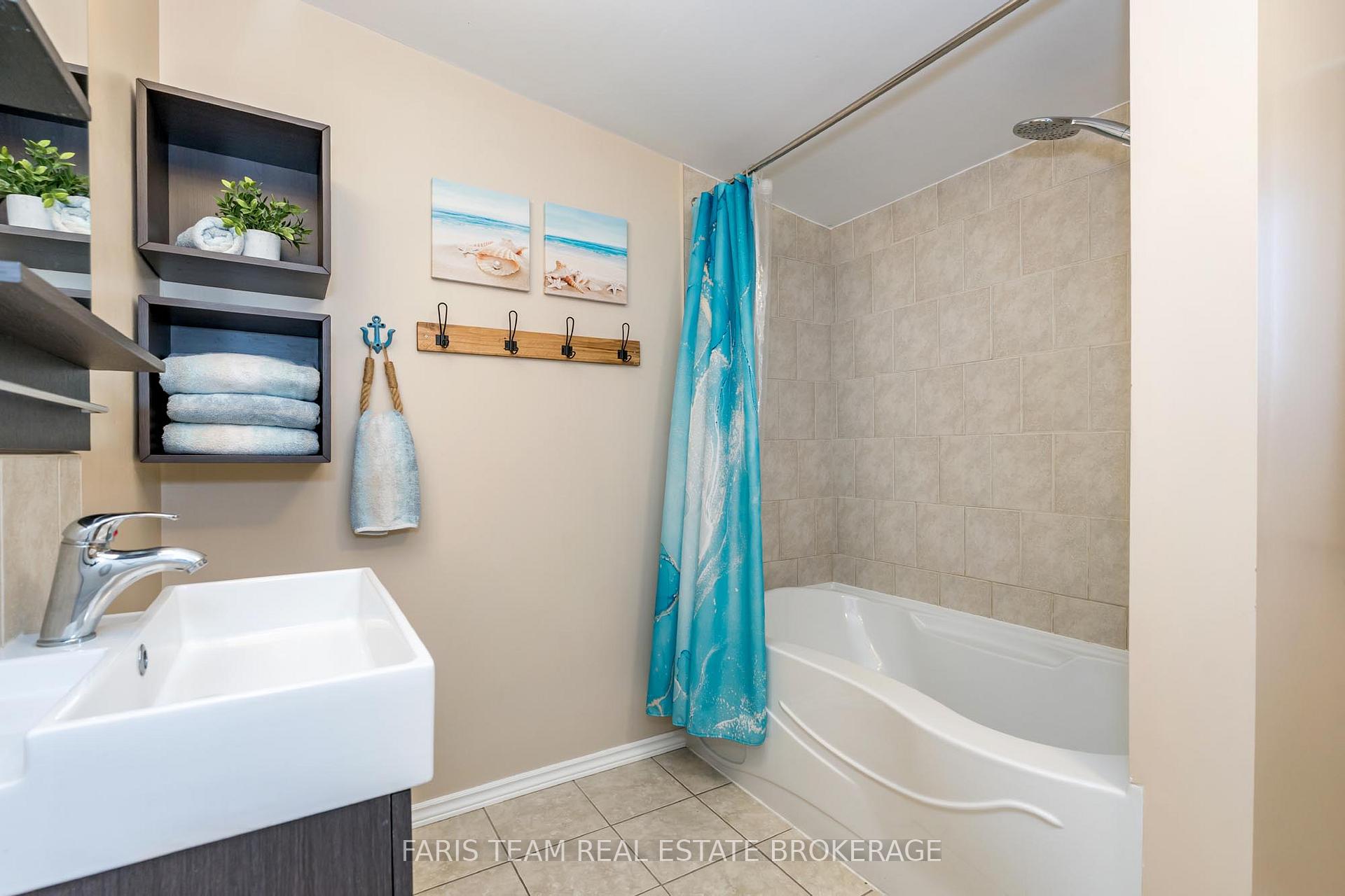 Photo 13 of 24 Old Mosley Street, Wasaga Beach — HOMEH