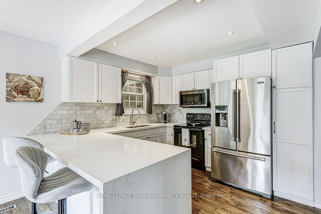 Photo 11 of 44 Canadian Oaks Drive, Whitby, Blue Grass Meadows — HOMEH
