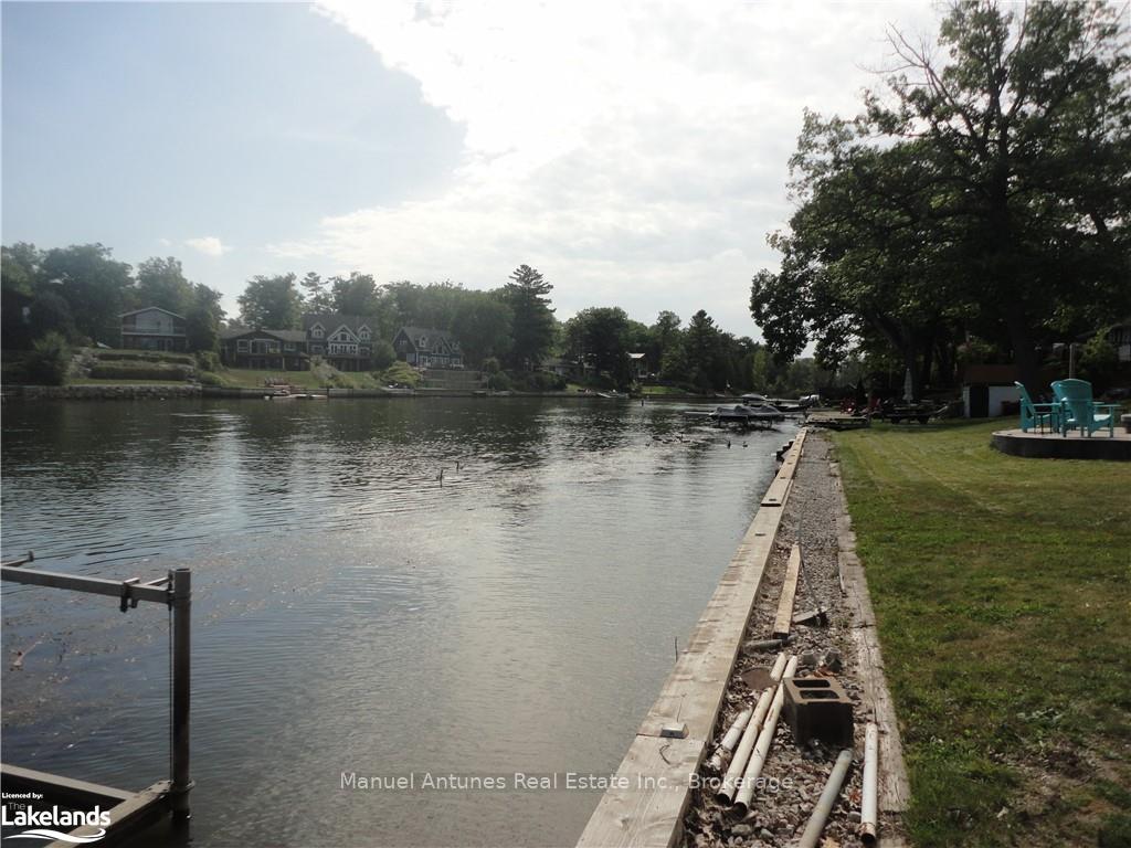 Photo 5 of 1089 Mosley Street, Wasaga Beach — HOMEH