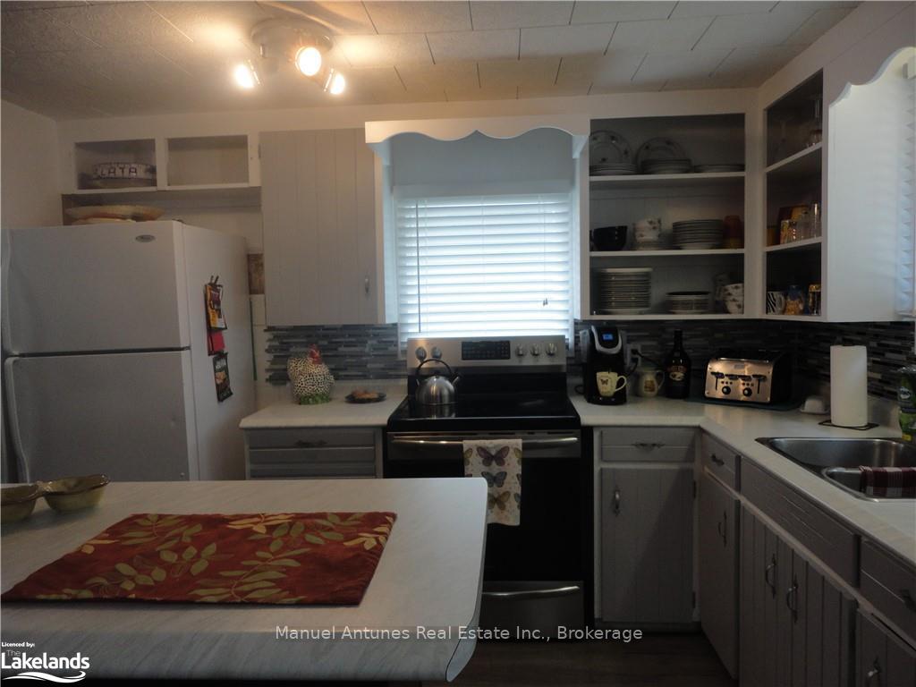 Photo 18 of 1089 Mosley Street, Wasaga Beach — HOMEH