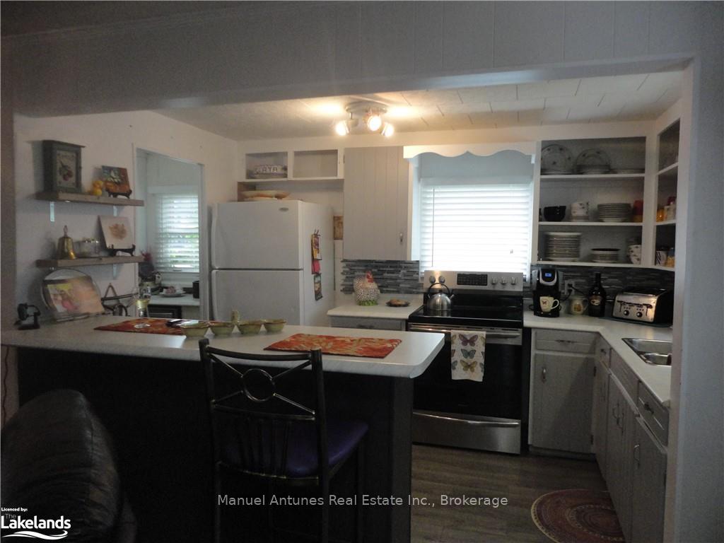 Photo 21 of 1089 Mosley Street, Wasaga Beach — HOMEH