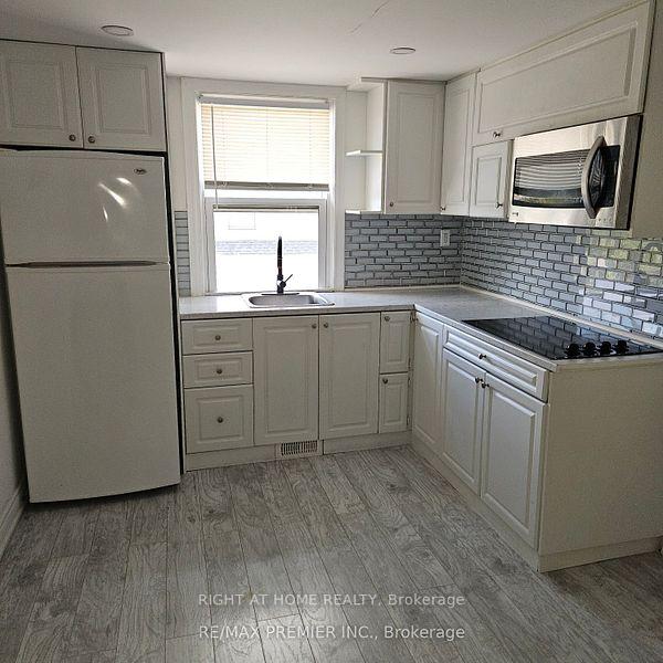 Photo 6 of Unit 2, 64 Wellington Street E, Aurora, Aurora Village — HOMEH