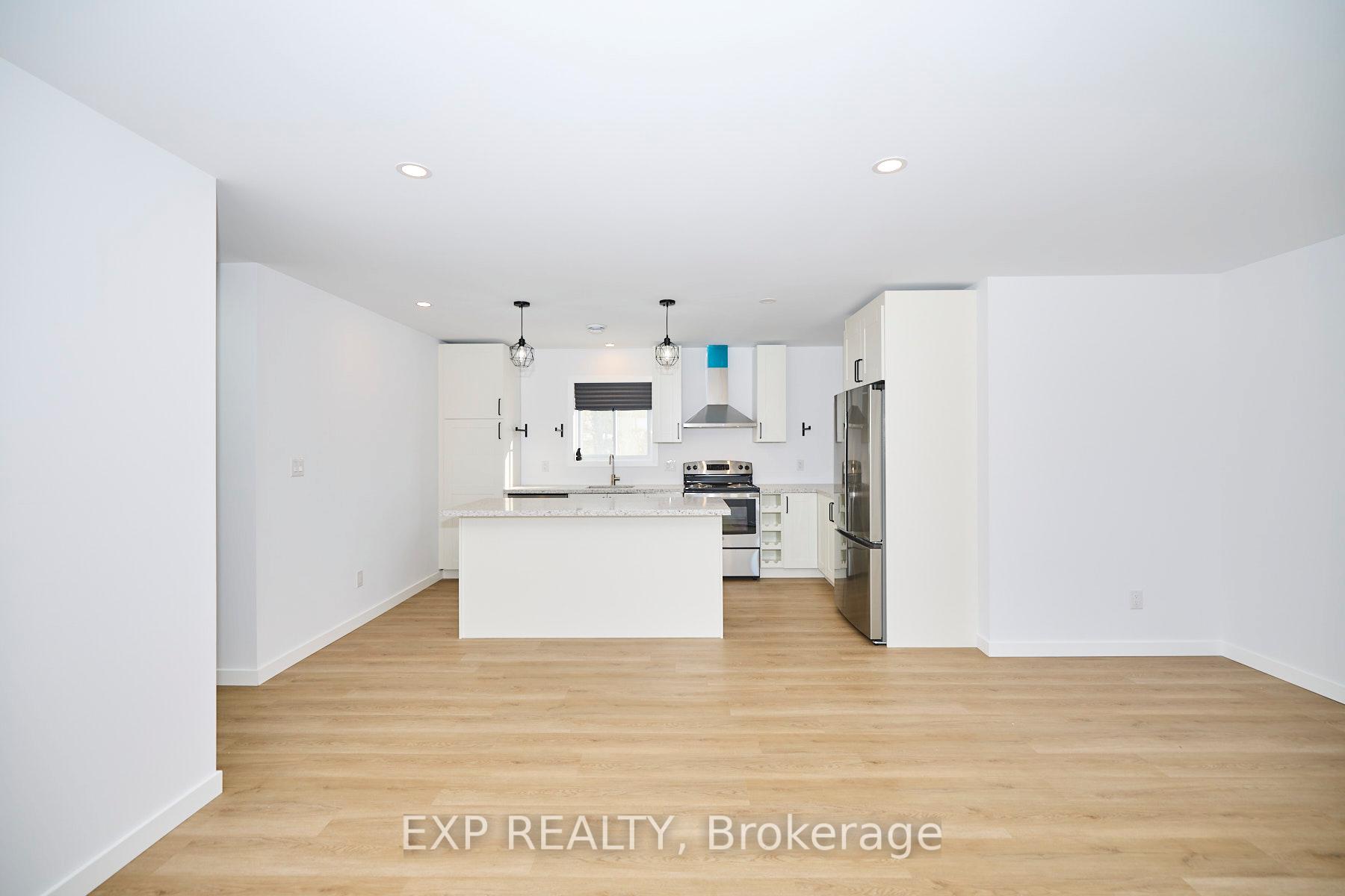 Photo 23 of Unit Unit #2, 24 Huron Street, Welland, Dain City — HOMEH
