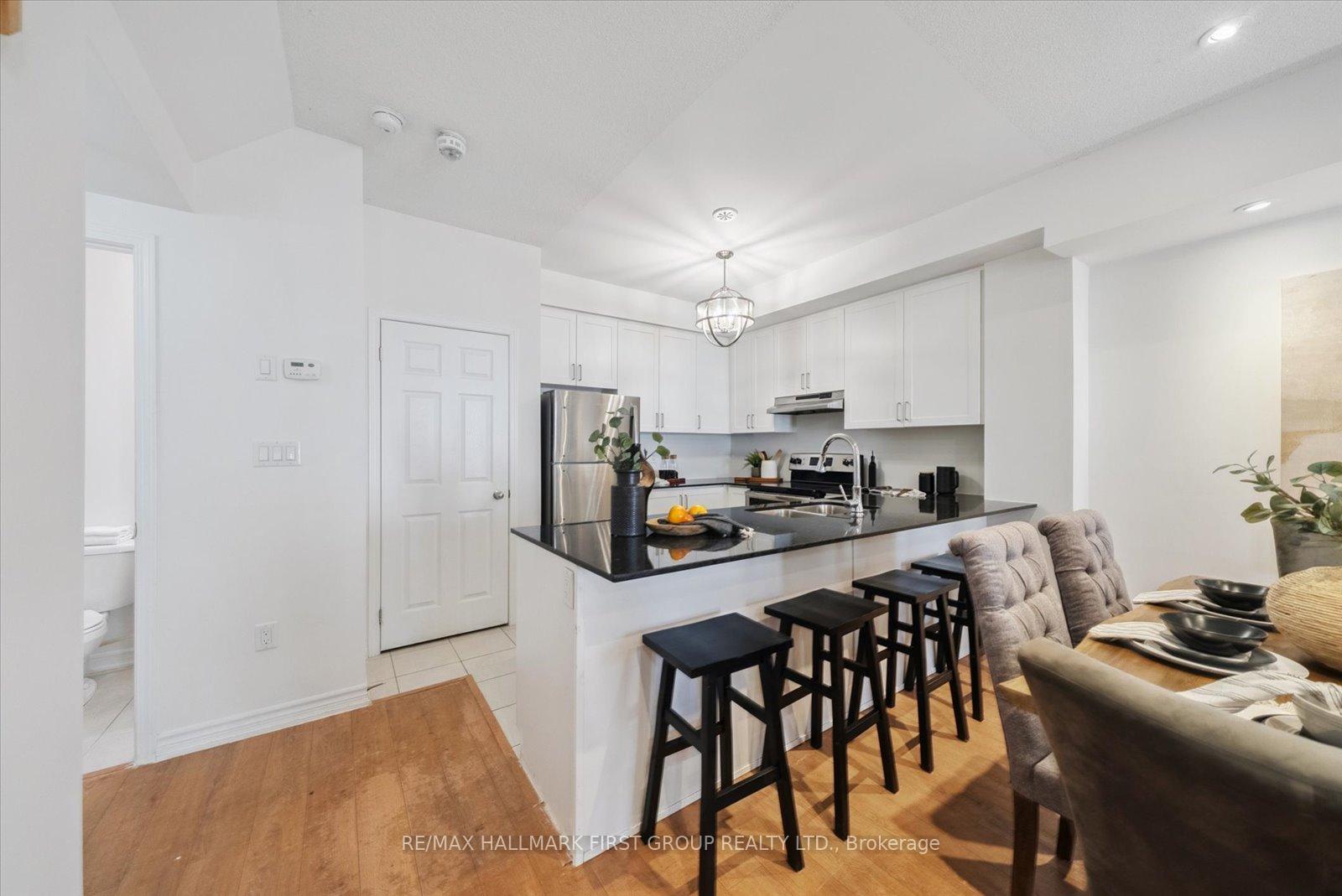Photo 15 of Unit 5, 1060 St. Hilda's Way, Whitby, Pringle Creek — HOMEH