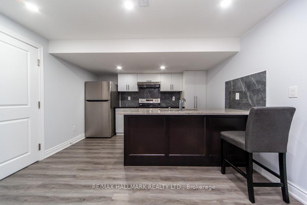 Photo 9 of Unit Bsmt, 21 Ronald Street, Whitby, Rural Whitby — HOMEH
