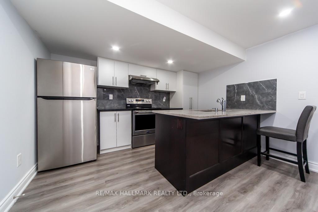 Photo 11 of Unit Bsmt, 21 Ronald Street, Whitby, Rural Whitby — HOMEH