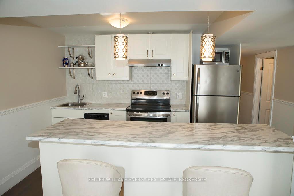 Photo 3 of Unit #BSMT, 100 Mildenhall Place, Whitby, Brooklin — HOMEH