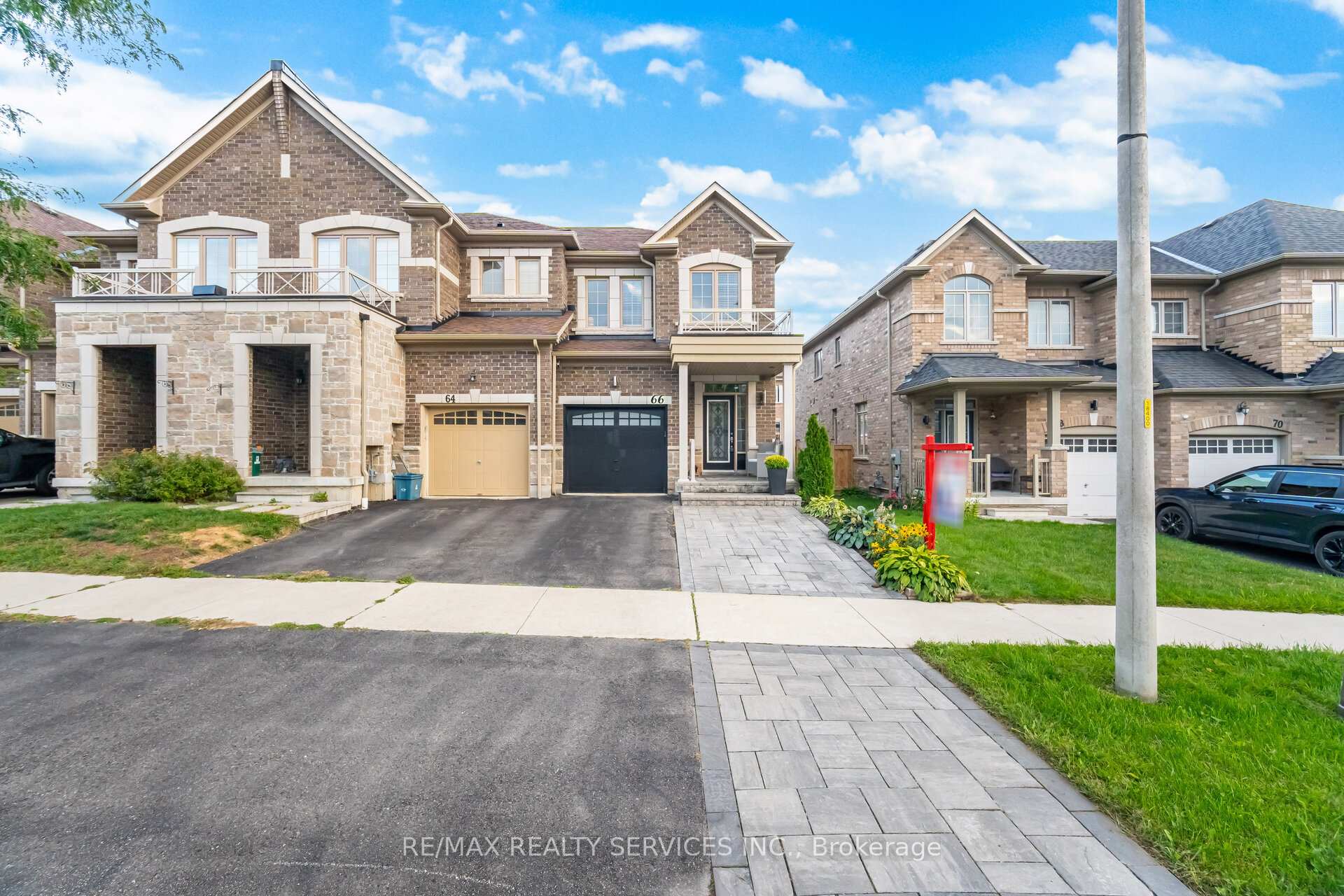 Front of 66 Rimrock Crescent