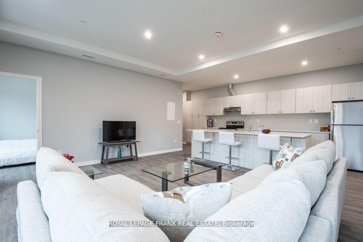 Photo 3 of Unit E1, 513 Dundas Street E, Whitby, Downtown Whitby — HOMEH