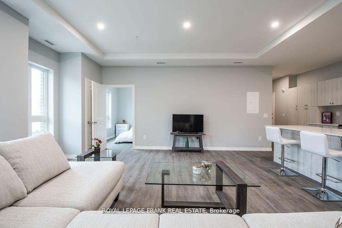 Photo 4 of Unit E1, 513 Dundas Street E, Whitby, Downtown Whitby — HOMEH