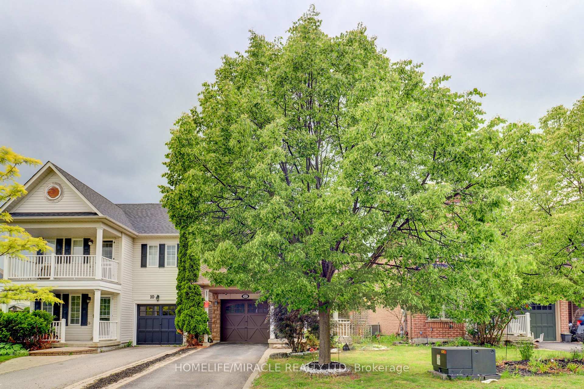 Photo 1 of 12 Breezewood Court, Whitby, Brooklin — HOMEH