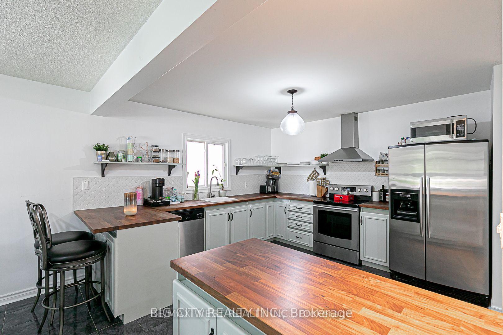 Photo 10 of Unit Main, 7698 Kipling Avenue, Vaughan, Vaughan Grove — HOMEH