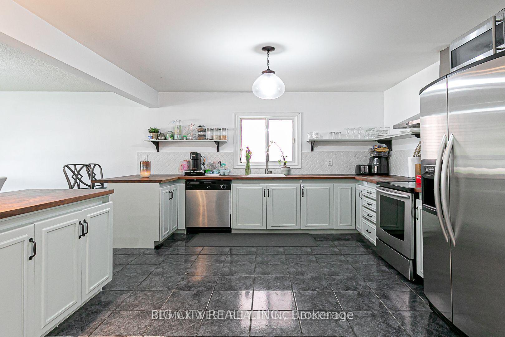 Photo 11 of Unit Main, 7698 Kipling Avenue, Vaughan, Vaughan Grove — HOMEH