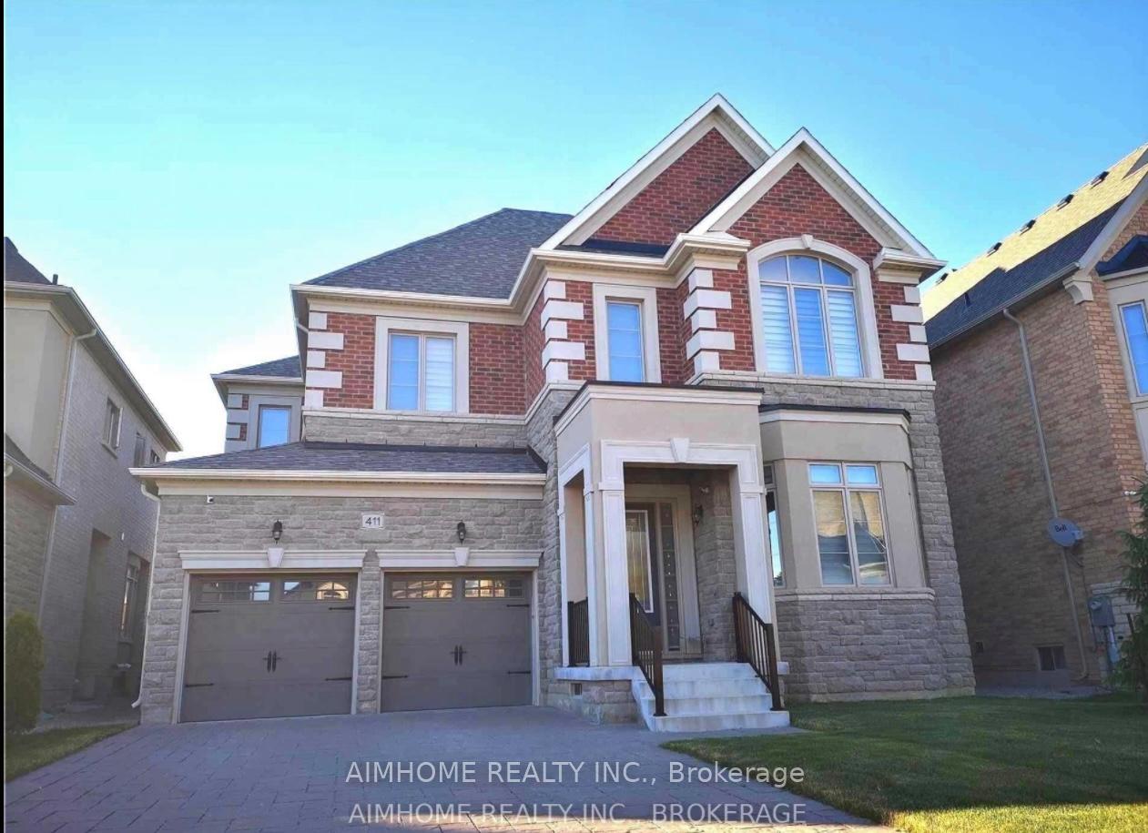 Front of 411 Woodgate Pines Drive